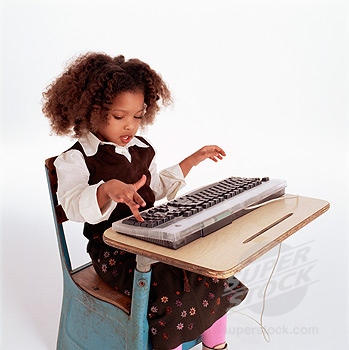 little girl typing